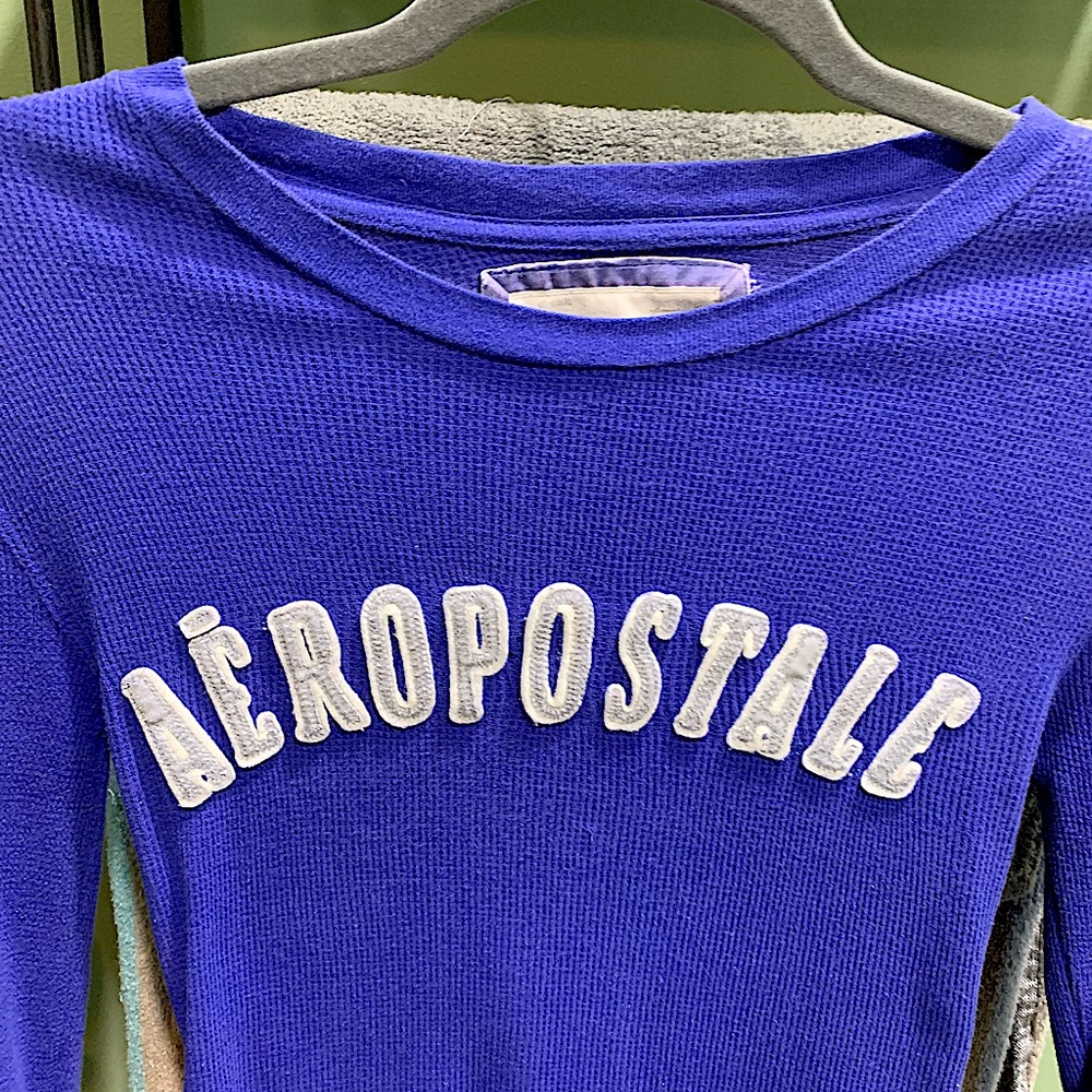 Thermal Aeropostale shirt . It has 3/4 inches sleeves cute shirt fits great